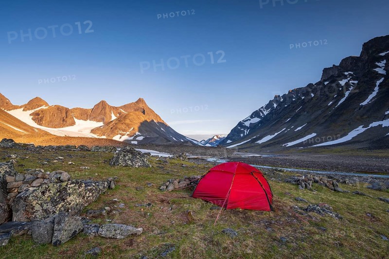 Red tent in Kaskasavagge valley, Kaskapakte glacier and mountains, mountain Kaskasatjakka and Kuopertjakka, river Gaskkasjohka, Kebnekaise massif, Lapland, Sweden, Europe