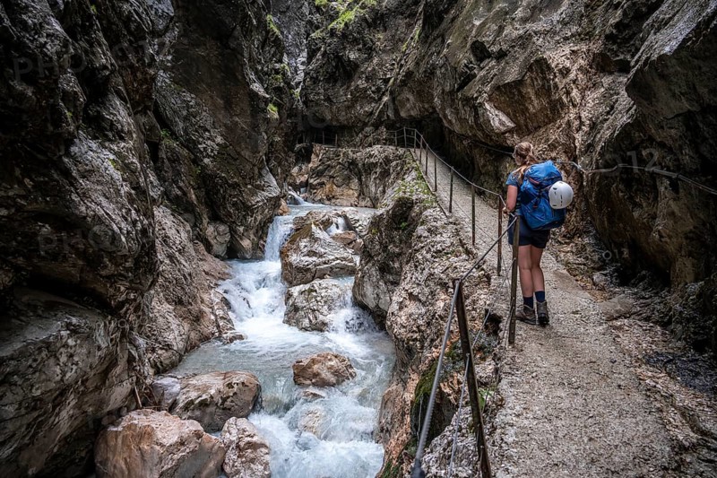 Hiker in a gorge, Hammersbach flows through Höllentalklamm, near Garmisch-Partenkirchen, Werdenfelser Land, Upper Bavaria, Bavaria, Germany, Europe