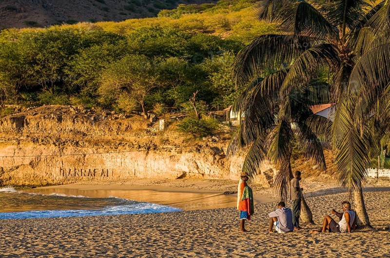 Young men, staying afternoon at sandbeach. Tarrafal. Santiago. Cabo Verde. Africa