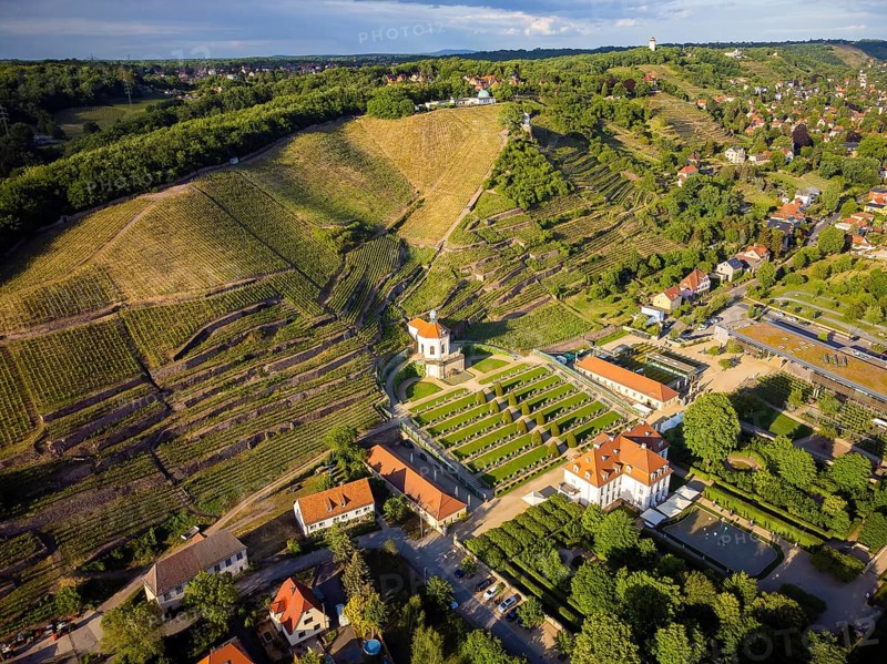 Wackerbarth Castle, originally Wackerbarths Ruh', is a Baroque castle surrounded by vineyards in the Radebeul district of Niederlössnitz on the road to Meissen, which serves as the seat of the Saxon State Winery. The winery belongs to the single vineyard Radebeuler Johannisberg within the large vineyard Lössnitz and is located in the listed historical vineyard landscape Radebeul