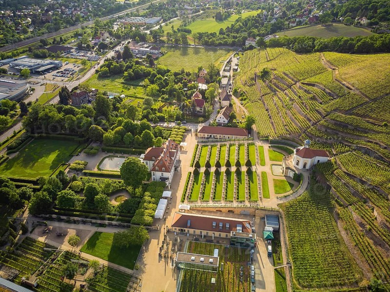Wackerbarth Castle, originally Wackerbarths Ruh', is a Baroque castle surrounded by vineyards in the Radebeul district of Niederlössnitz on the road to Meissen, which serves as the seat of the Saxon State Winery. The winery belongs to the single vineyard Radebeuler Johannisberg within the large vineyard Lössnitz and is located in the listed historical vineyard landscape Radebeul