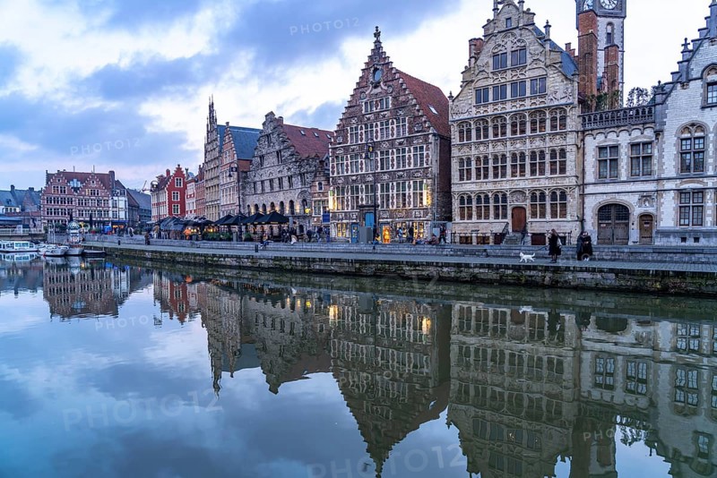 Medieval guild houses of Graslei Kai on the river Leie at dusk, Ghent, Belgium, Europe