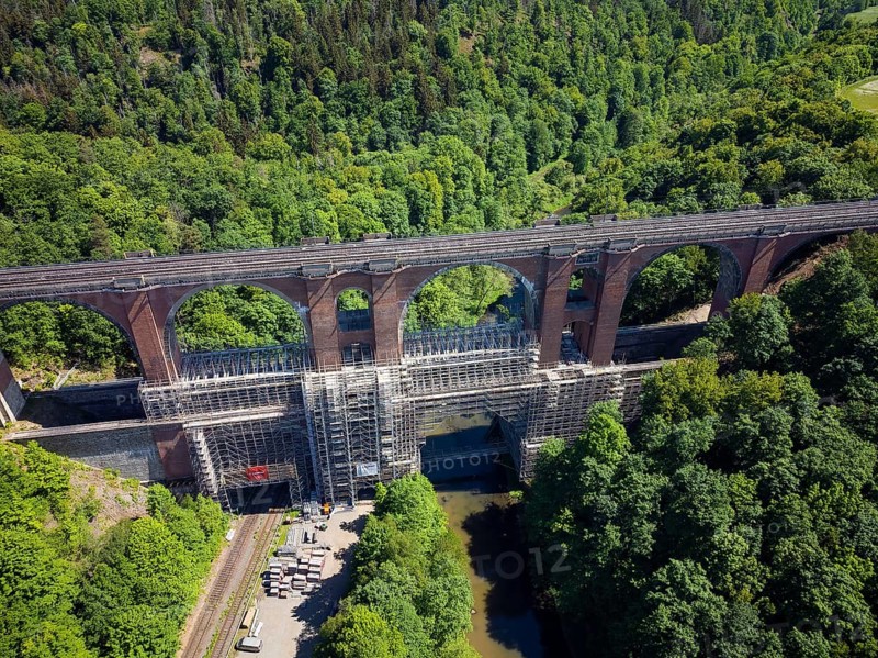 The Elstertalbrücke is a railway bridge in the Vogtland district of Saxony. It carries the Leipzig-Hof railway line near Jocketa over the Weisse Elster and the Gera Süd-Weischlitz railway line running alongside the river. The 68 m high structure is considered the second largest brick bridge in the world after the Göltzschtal Bridge. It will be scaffolded and renovated in 2022
