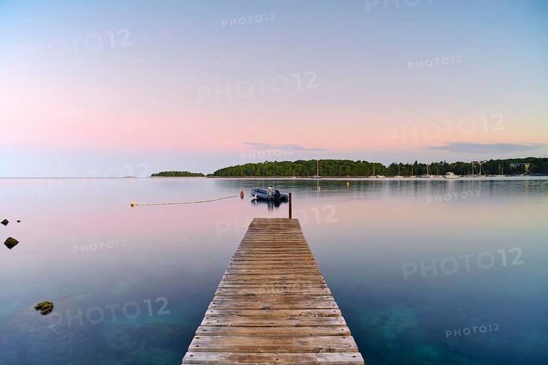 Jetty with boat at sunrise, Adriatic Sea, Rovinj, Istria, Croatia, Europe