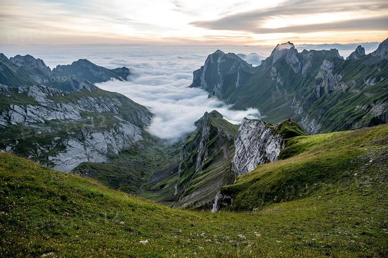 View over Säntis mountains into the valley of Meglisalp at sunrise, high fog in the valley, Säntis, Appenzell Ausserrhoden, Appenzell Alps, Switzerland, Europe