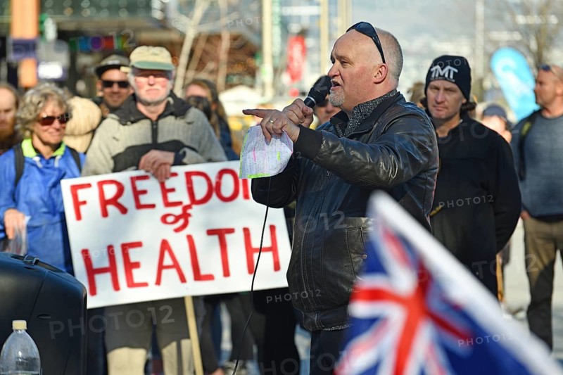 CHRISTCHURCH, NEW ZEALAND, JULY 24, 2021, A man speaks at a protest rally at the Bridge of Remembrance in Christchurch. Activists spoke against increasing government control over Covid vaccinations, farm taxes and civil liberties