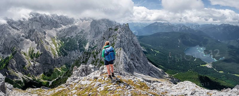Mountaineer climbing Waxenstein, Eibsee lake and Wetterstein Mountains, Garmisch-Patenkirchen, Bavaria, Germany, Europe