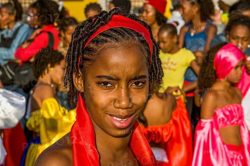 Portrait of colourful costumed, pretty woman. Carnival. Mindelo. Cabo Verde. Africa