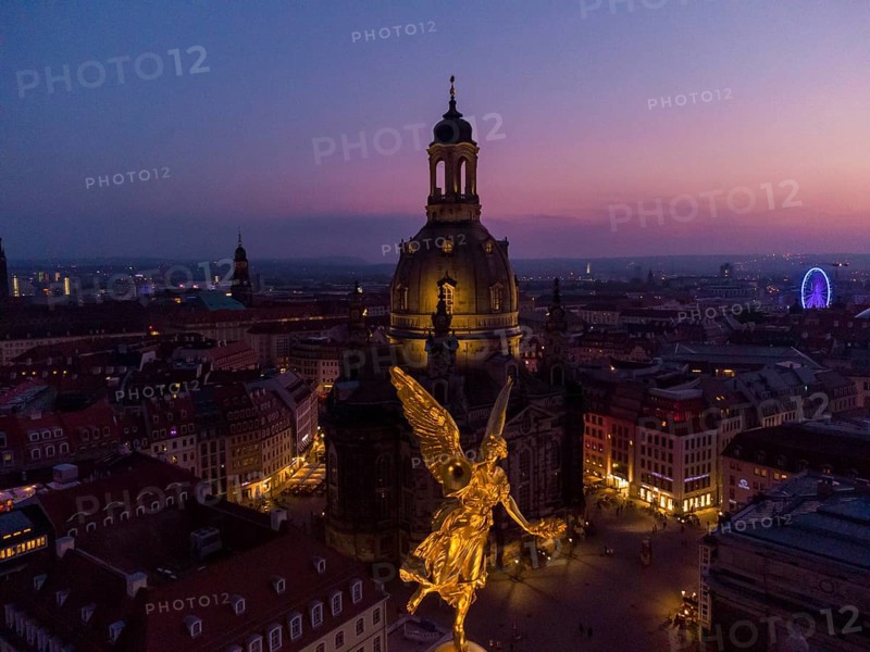 Dresden's old town from above.The glass dome of the Academy of Arts, crowned by a Fama figure, under which there is an exhibition room, called a lemon squeezer after its shape