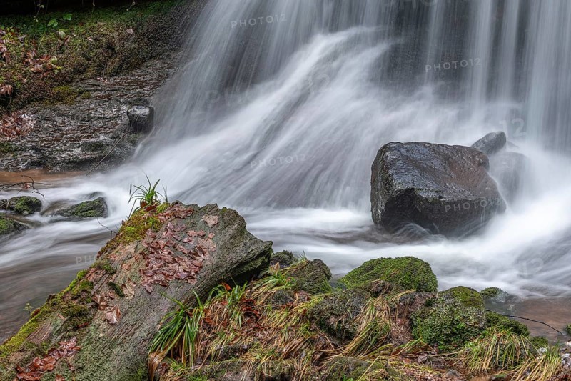 Beautiful fresh mountain waterfall in a wild and remote valley in winter. Vosges, Bas-Rhin, Collectivite europeenne d'Alsace, Grand Est, France, Europe
