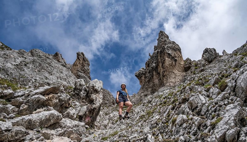 Mountaineer on the steep ascent to Waxenstein, Wetterstein Mountains, Garmisch-Patenkirchen, Bavaria, Germany, Europe