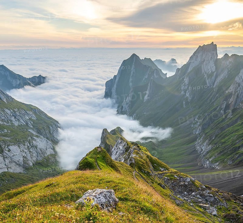 View over Säntis mountains into the valley of Meglisalp at sunrise, Rotsteinpass, high fog in the valley, Säntis, Appenzell Ausserrhoden, Appenzell Alps, Switzerland, Europe