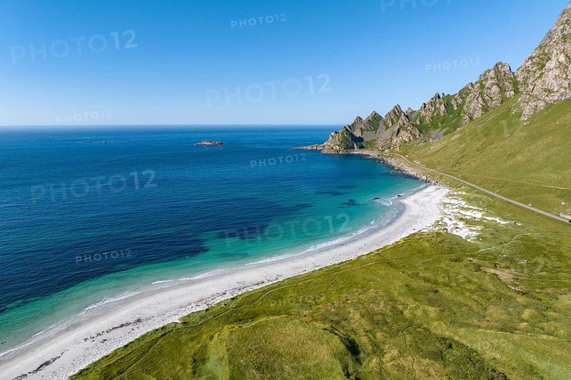 White sandy beach and mountains near Bleik, Andoya Island, Vesteralen, Norway, Europe