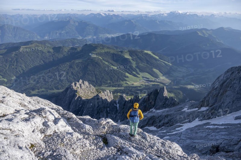 Hiker Looking down into the valley from the Hochkönig, Salzburger Land, Austria, Europe
