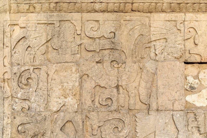 Carved wall stonework Mayan figures, The Ball Court, Juego de Pelota, Chichen Itza, Mayan ruins, Yucatan, Mexico, Central America