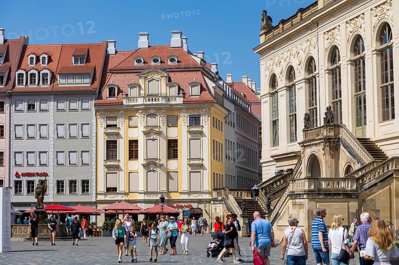 Tourists stroll across the Neumarkt in Dresden