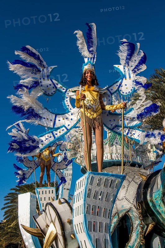 Colourful costumed, pretty women are dancing. Carnival. Mindelo. Cabo Verde. Africa