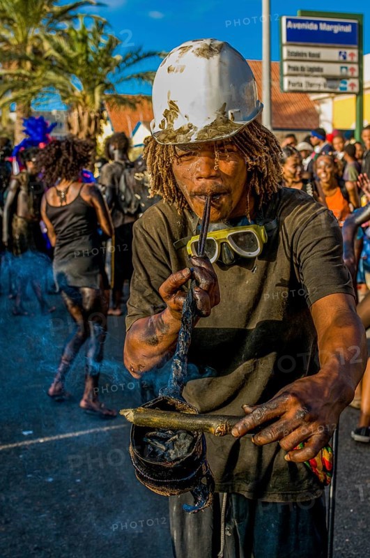 Man with helmet, costumed as constructer. Carnival. Mindelo. Cabo Verde. Africa
