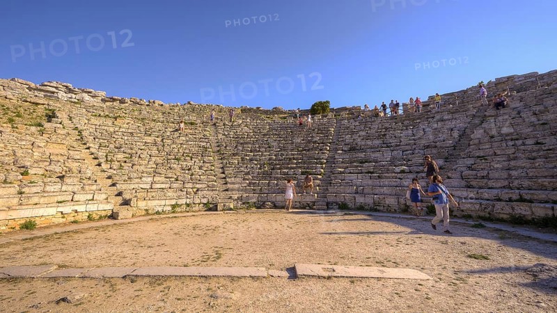 Evening light, Roman amphitheatre, few visitors, Segesta, Ancient site, Archaeological site, Doric, Trapani province, Sicily, Italy, Europe
