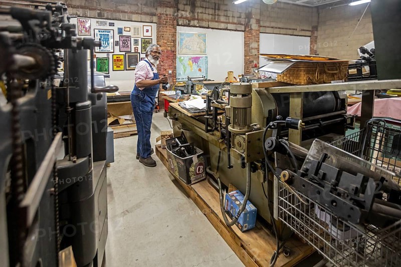 Detroit, Michigan, Amos Kennedy works in his letterpress printing shop. Kennedy prints posters and gives workshops on letterpress printing