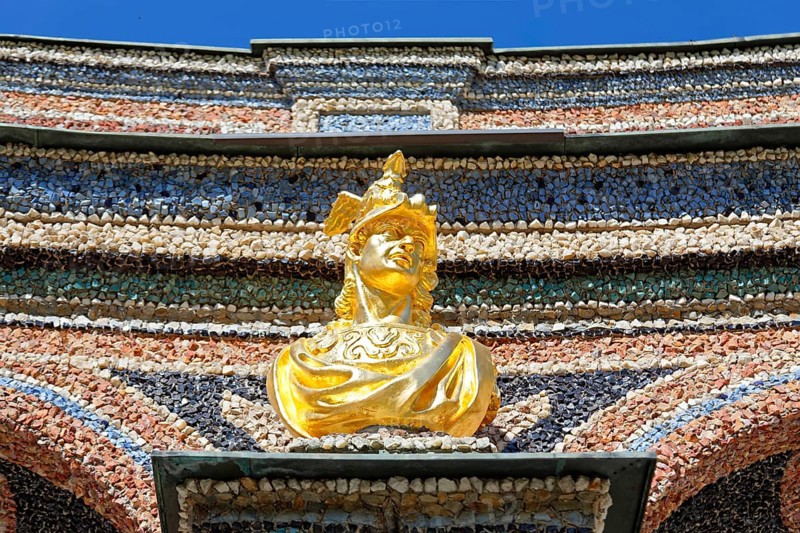 Gilded bust, facade, exterior walls, decorated, colourful, coloured stones, crystals and glass pieces, mosaic, mosaic-like arrangement, New Palace, Orangery, Hermitage, historical park, landscape park, Rococo, built from 1715, Eremitage district, Bayreuth, Upper Franconia, Franconia, Bavaria, Germany, Europe