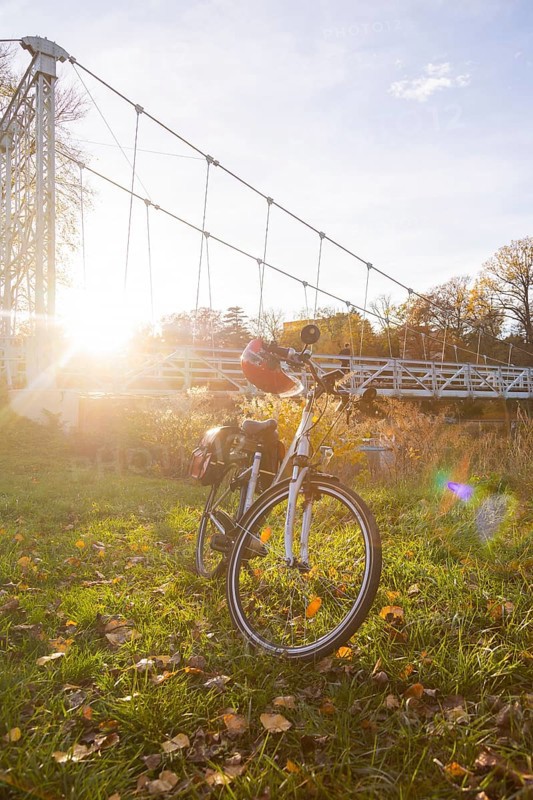Symbolic image Resting on an e-bike tour in the Leipzig region in Grimma at the Mulde bridge