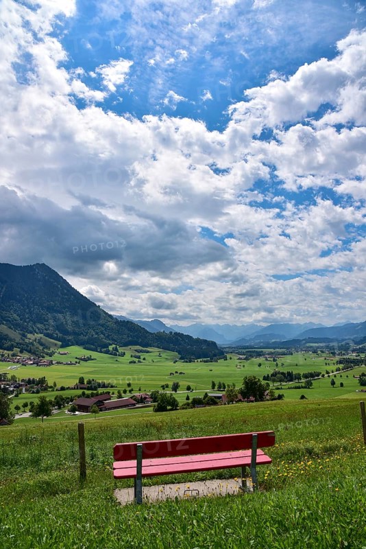 Resting bench on the Gebhardshöhe above the municipality of Rettenberg in Allgäu, Bavaria, Germany, Europe