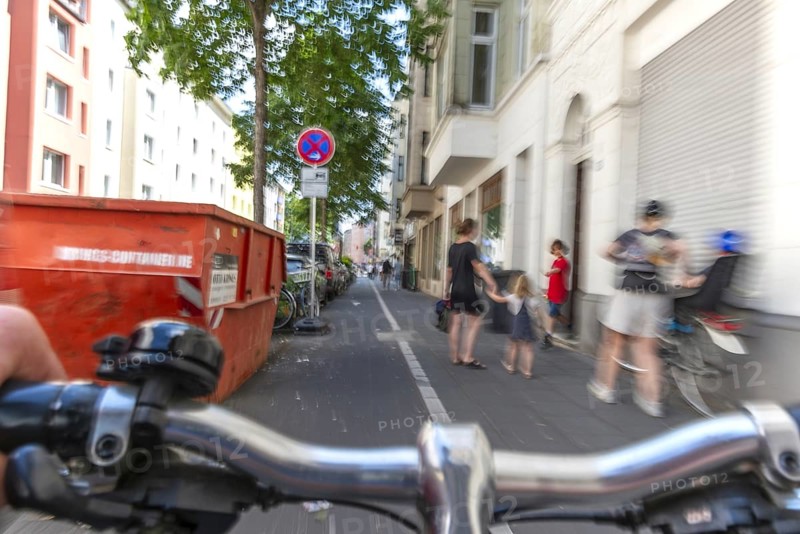Cycling from a first-person perspective on a cycle path in Cologne, North Rhine-Westphalia, Germany, Europe