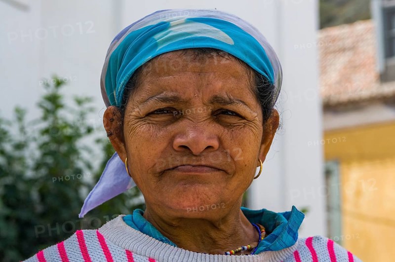 Portrait of grinning woman with headscarf. San Antao. Cabo Verde. Africa