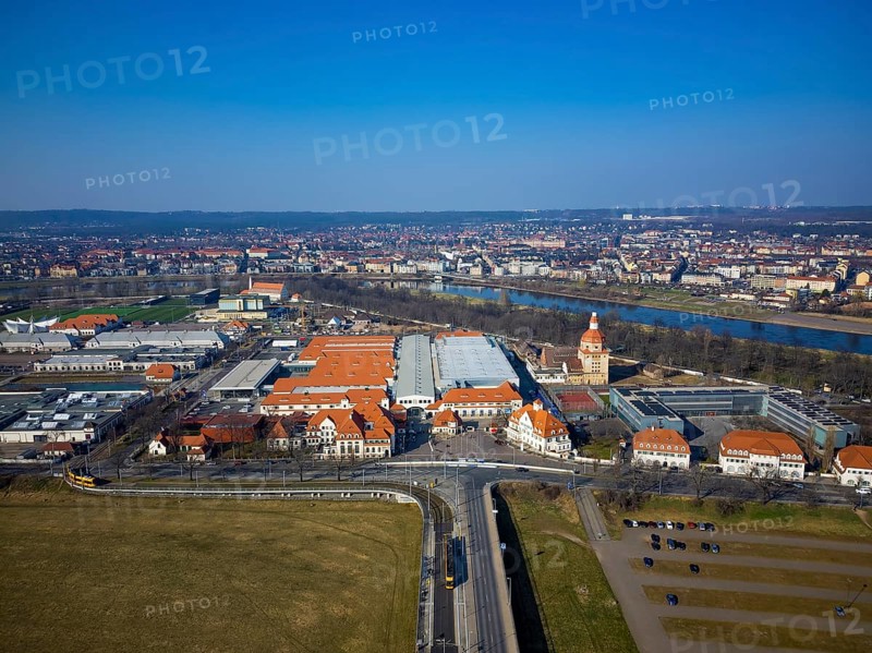New Dresden Trade Fair Centre in the former Erlwein slaughterhouse.Dresden Sports High School on the right