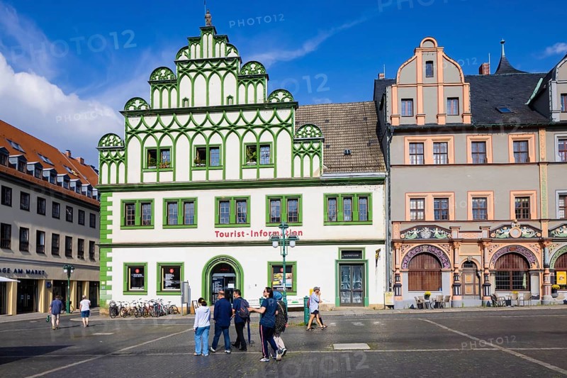 The square was given its distinctive shape in the 16th century by the town house and the semi-detached house to the east, the left half of which is now known as the Cranach House, the Court Pharmacy to the north and the inn Zum Schwarzen Bären to the south.In the centre of the market, the Neptune Fountain