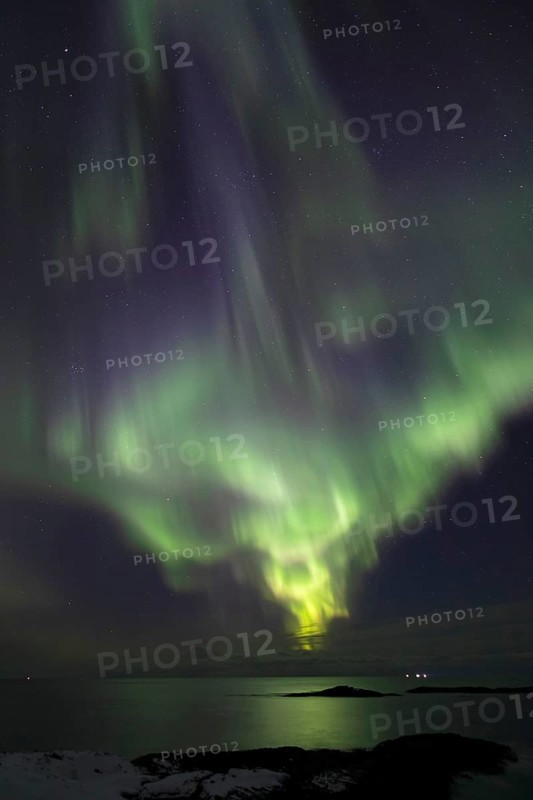 Northern Lights (Aurora borealis) in green and blue over the North Sea, Andoya, Vesteralen, Norway, Europe
