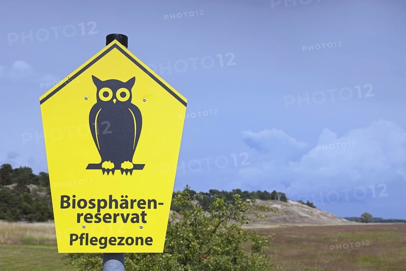 Sign with biosphere reserve logo in the Inland Dunes by Klein Schmölen near the Elbe river, Mecklenburg Elbe Valley Nature Park, Mecklenburgisches Elbetal, Mecklenburg-Vorpommern, Germany, Europe