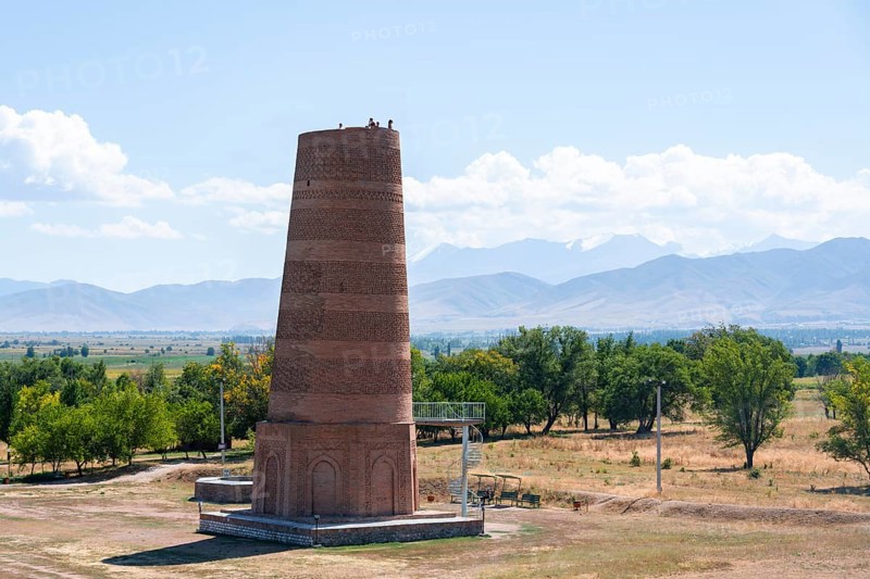 Burana Tower, remains of Karakhanid Minaret, histroic ancient city of Balasagun on the Silk Road, Balbals, historic tombstones in the shape of human faces, near Tokmok, Chuy, Kyrgyzstan, Asia