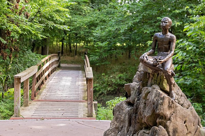 Diamond, Missouri, The Boy Carver statue, by sculptor Robert Amendola, at George Washington Carver National Monument. The monument preserves the Moses and Susan Carver farm where Carver was born as a slave in about 1864. It was the first National Monument to honor an African-American