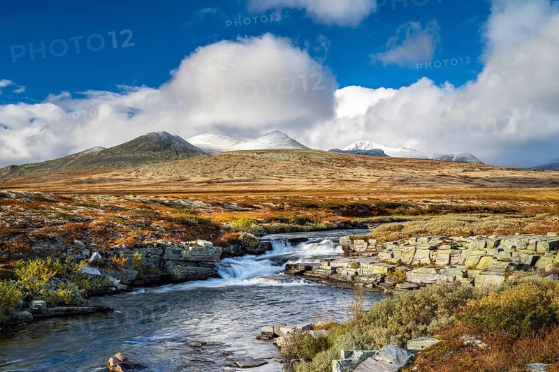Autumnal mountain landscape with river Store Ula, Rondane National Park, Norway, Europe