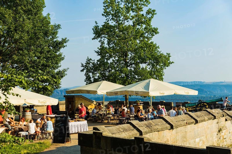 Morning picnic high above the Elbe valley, Königstein Fortress. The champagne breakfast is served in the morning light on the Blitzeichen plateau with a view of the Lilienstein and the Elbe