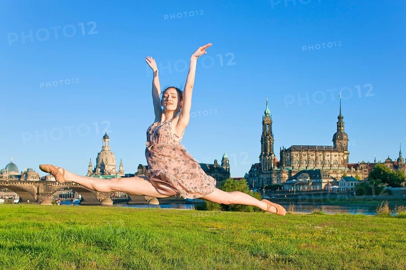 Young woman on the Elbe meadows in Dresden