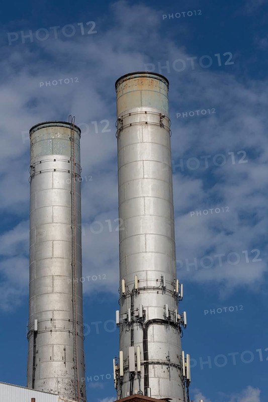 Detroit, Michigan, Smokestacks with wireless communications equipment on the Detroit Thermal steam generating plant. The natural gas-fired plant delivers steam to more than 100 buildings in downtown Detroit