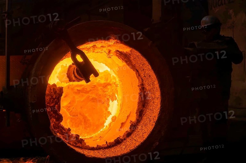 The Schmees foundry in Pirna, glowing ingot moulds