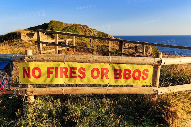 Sign on the railings, No fires or barbecues, Nature conservation, Dorset, England, Great Britain