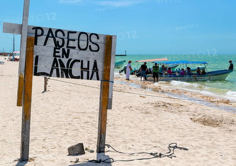 Sign at launch point on beach for tourist boat trips, Paseos en Launch, Celestun, Yucatan, Mexico, Central America