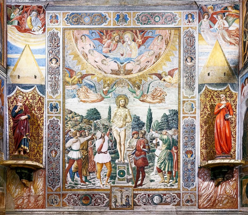 Martyrdom of St. Sebastian, Martirio di San Sebastiano, fresco by Benozzo Gozzoli, wooden sculptures, Mary and Angels, Annunciation by Jacopo della Quercia, Collegiata di Santa Maria Assunta also Duomo di San Gimignano, San Gimignano, Province of Siena, Tuscany, Italy, UNESCO World Heritage Site, Europe