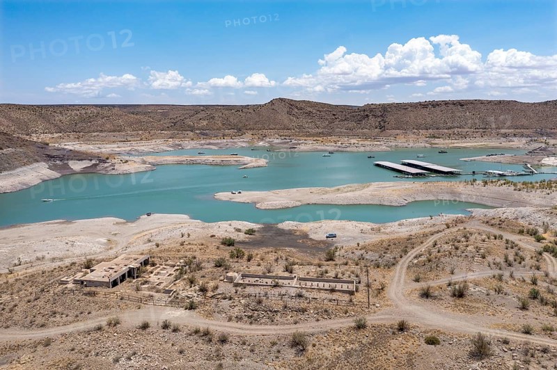 Truth or Consequences, New Mexico, The Elephant Butte reservoir on the Rio Grande holds water for southern New Mexico and western Texas, but is only 7% full due to the drought in the southwestern United States. When the reservoir was full, scuba divers used to practice on the roof of the building at bottom left, which was 20-30 feet below the surface