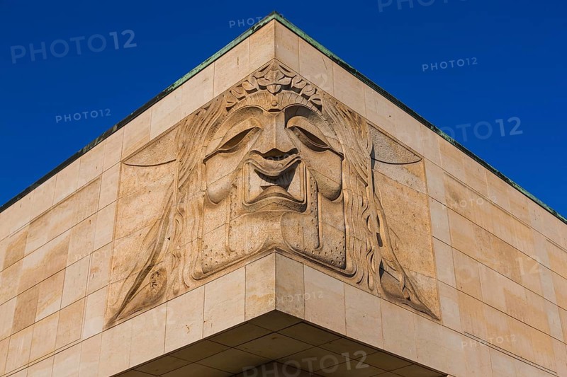 Dresden Functional Building of the Semper Opera, Makolies created four sandstone masks for the exterior façade of the Semper Opera's functional building, which is used as a rehearsal stage, functional building and seat of the administration. They were created between 1982 and 1984 and measure 2.7 by 5.2 metres