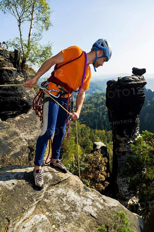 Climbers in Rathen in Saxon Switzerland