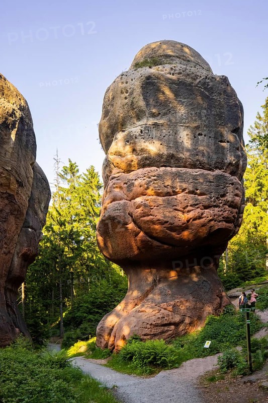 The Kelchstein is a mushroom rock in the Zittau Mountains near Oybin in Saxony and is part of the Kelchsteine natural monument. The Kelchstein is made of chalk sandstone, which is quite poor in binders. Its unusual mushroom shape is due to the effect of wind abrasion and erosion on the various hard sandstone layers
