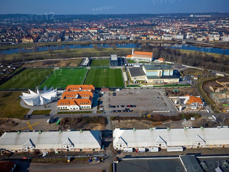Former Erlwein Slaughterhouse with Osatra Dome and Genussweltern Pavilion