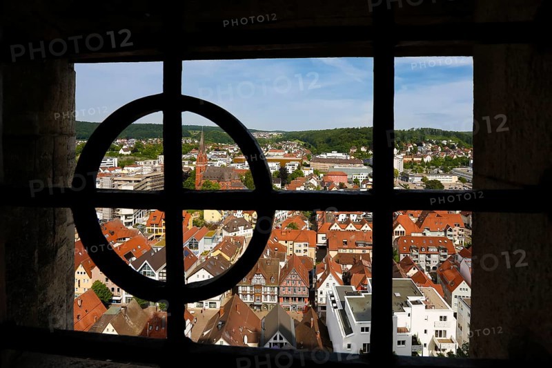 View of the town of Heidenheim through iron bars, Hellenstein Castle, buildings, houses, church, roofs, Heidenheim an der Brenz, Baden-Württemberg, Germany, Europe