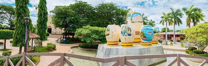 Beautiful panoramic view of the central park of Nagarote, Nicaragua. Panoramic view of a beautiful park surrounded by vegetation